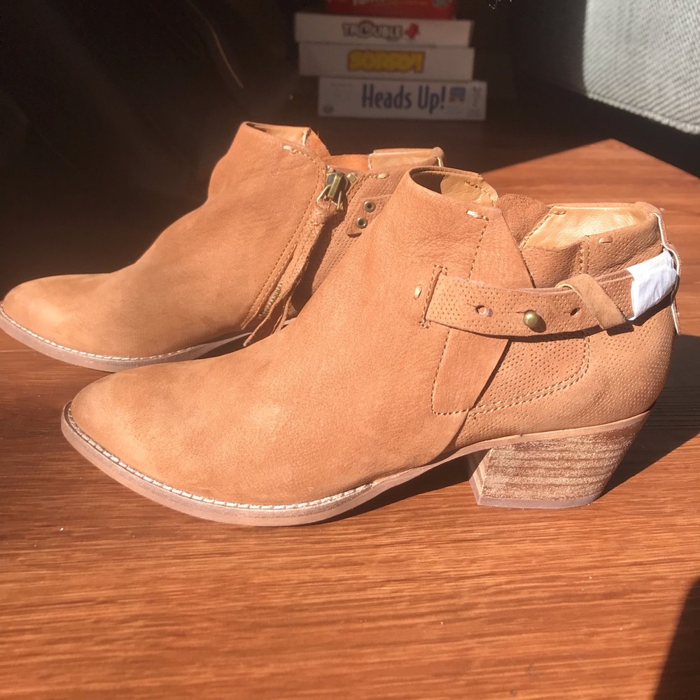 Tan equestrian boots
